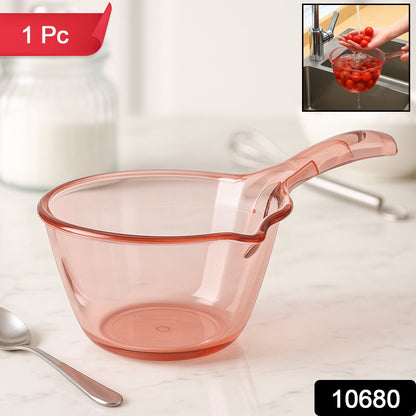 Close-up of the built-in strainer slot on kitchen washing bowl