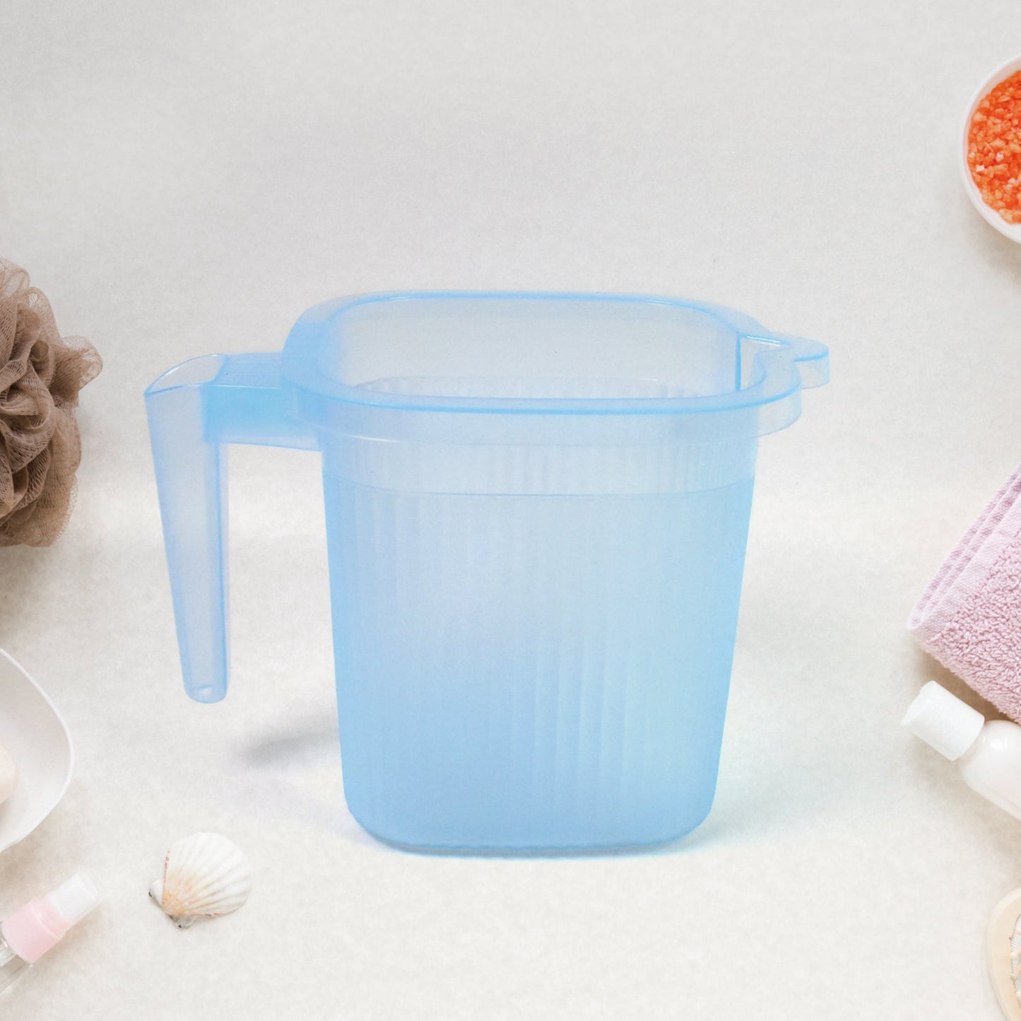 Ergonomic Transparent Bath Mug, highlighting its comfortable design.
