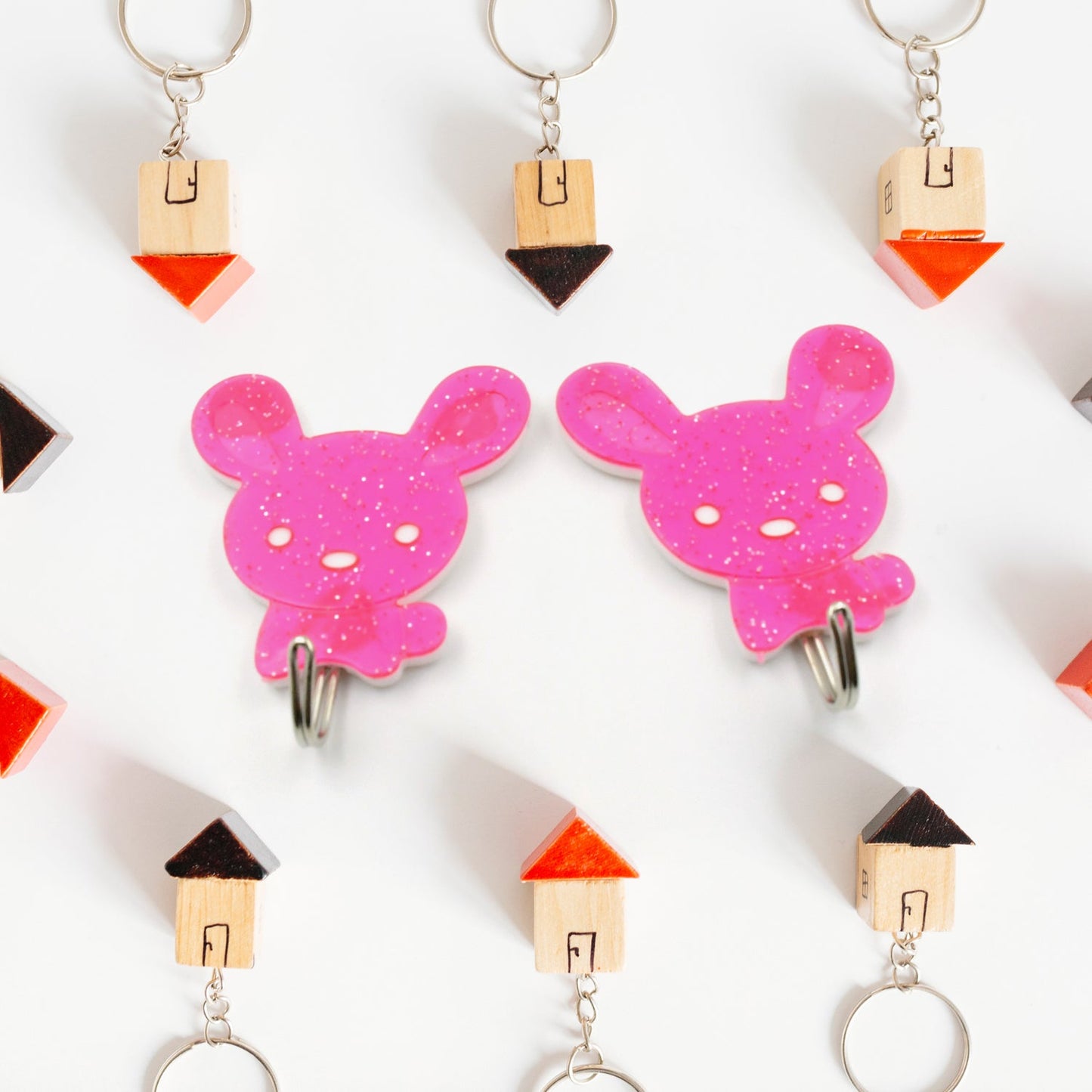 Pack of two strong self-adhesive hooks for versatile home organisation.