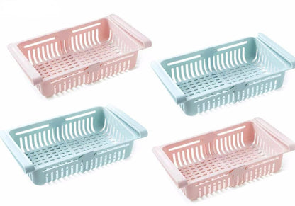 Multiple adjustable fridge storage baskets neatly arranged in a refrigerator.