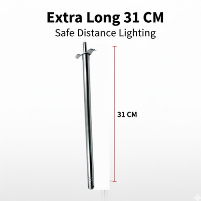 Stainless steel gas lighter igniting a kitchen stove burner.