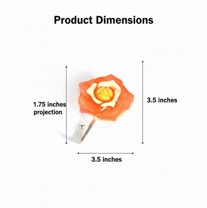 A single self adhesive wall hook with a floral design, ready for installation.