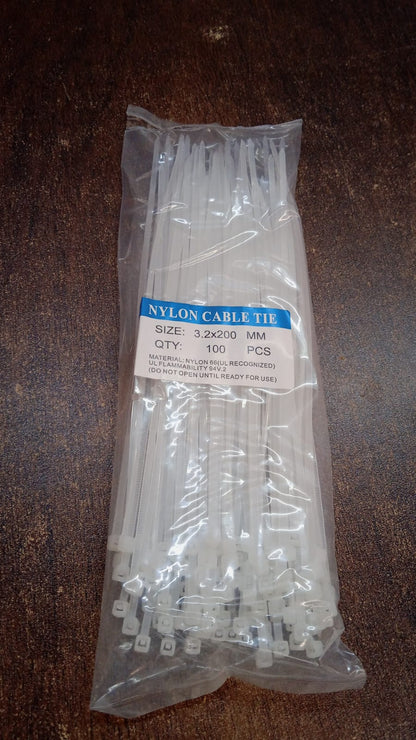 A pile of black nylon cable ties, showcasing their quantity and readiness for use.