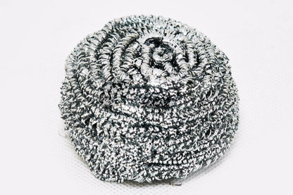 Round stainless steel scrubber showing its intricate wire design for superior scrubbing.