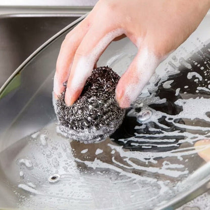 Pack of 12 round stainless steel scrubbers ready for heavy-duty kitchen cleaning.
