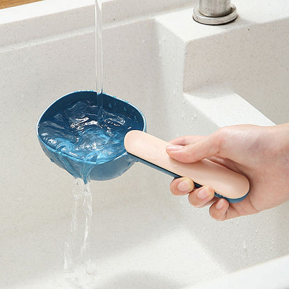 Versatile pet food scoop with handle clip shown from multiple angles.