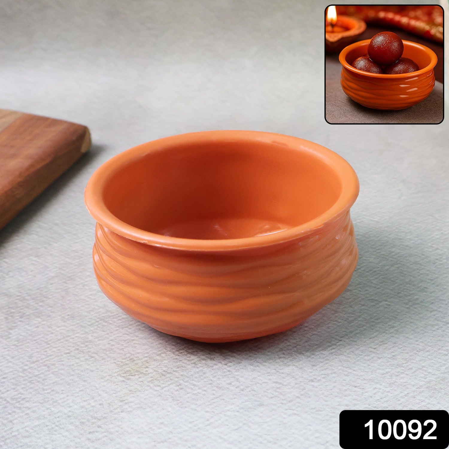 Terracotta bowl styled on a traditional serving table