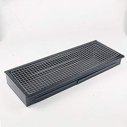 Components of the FirePot portable charcoal BBQ grill laid out for assembly.