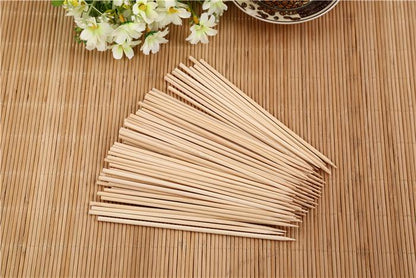 Neatly bundled 30cm bamboo BBQ sticks, perfect for any grilling occasion.