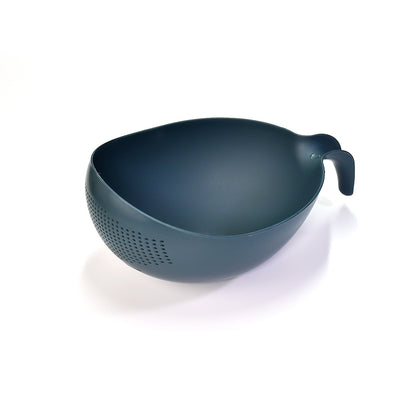 White plastic bowl with integrated strainer for washing rice and delicate fruits.