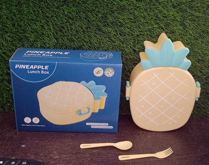 Colorful retail packaging box for the pineapple kids bento lunch box, showcasing its features.