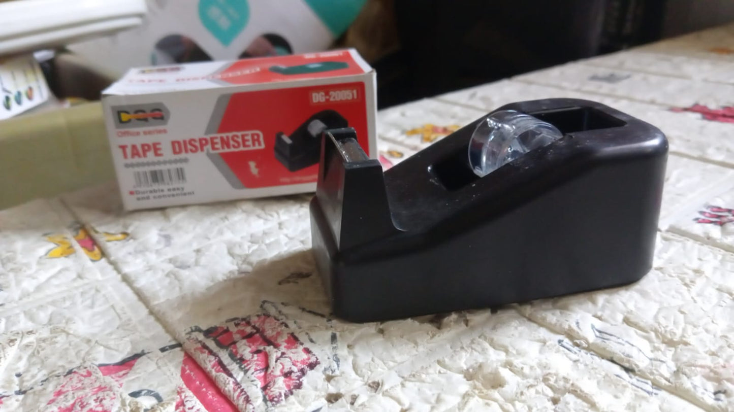 The VoltDesk tape dispenser in its original product packaging, displayed on a clean surface.