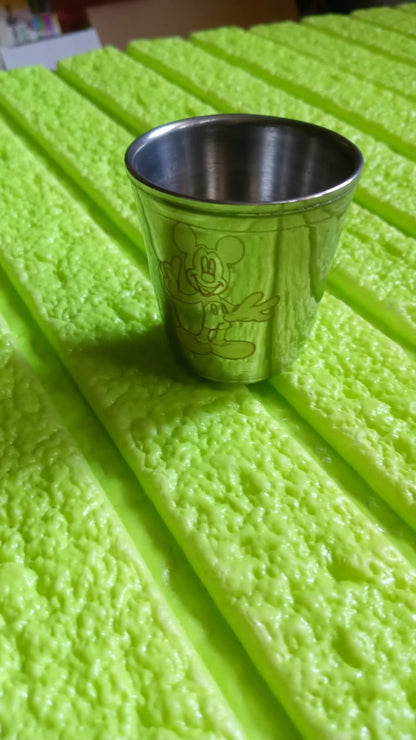 Full view of the 6-piece stainless steel kids glass set with bell.