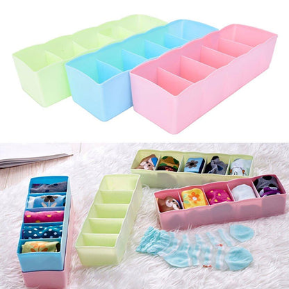 Clear view of socks and handkerchiefs within the 5-compartment storage box.