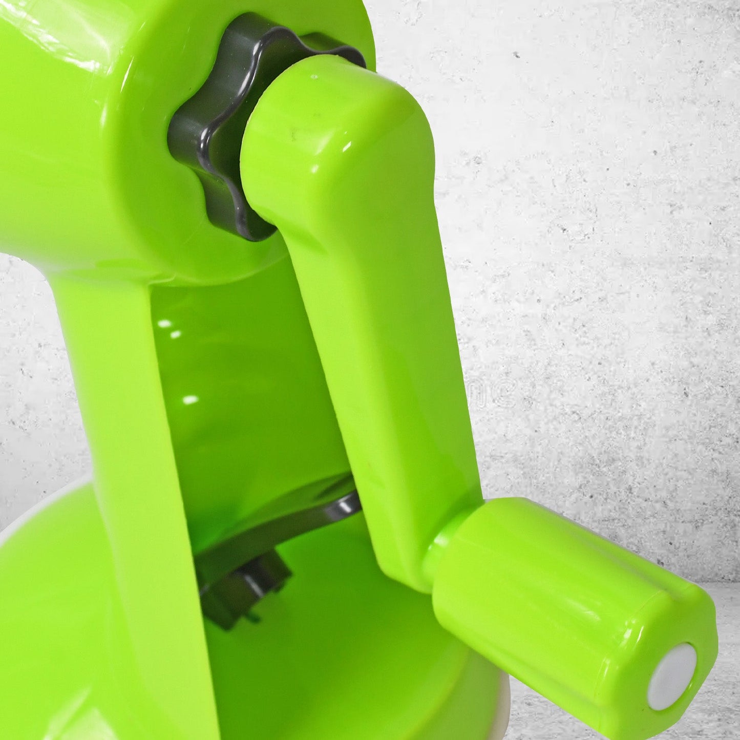 Multi-functional vegetable grater with a rotary handle for easy use.