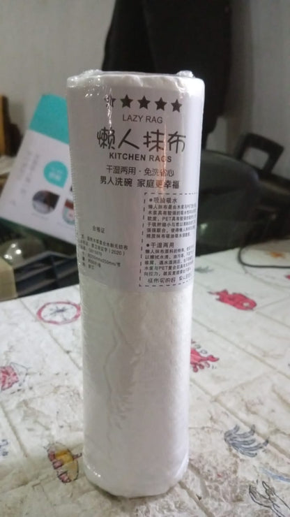 Durable kitchen tissue sheet being used to clean a car surface.