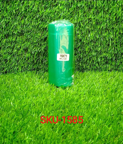 Green biodegradable garbage bags in a compact roll, ideal for responsible waste disposal.
