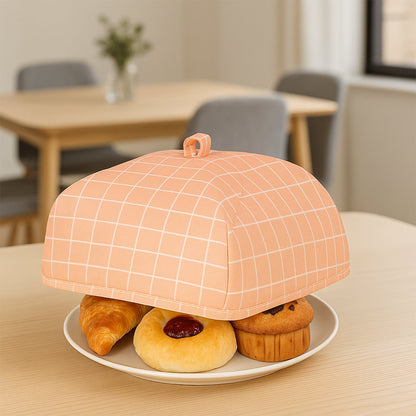Foldable Food Cover open on a rustic wooden table, ready to protect dishes.