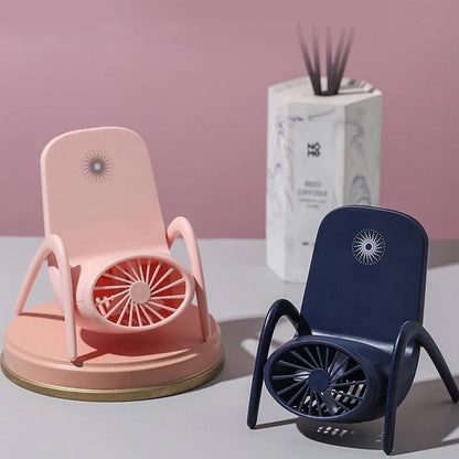 Portable Phone Holder Fan in white, showcasing its compact design and integrated stand.