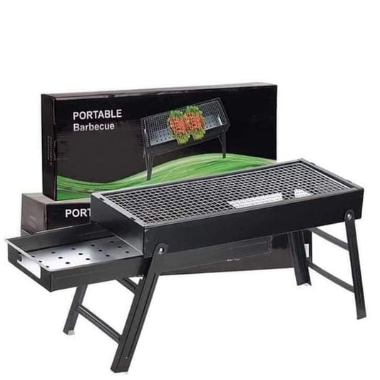 FirePot portable charcoal BBQ grill unfolded and ready for use outdoors.