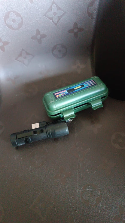 Side view of the versatile rechargeable mini flashlight with metallic finish.