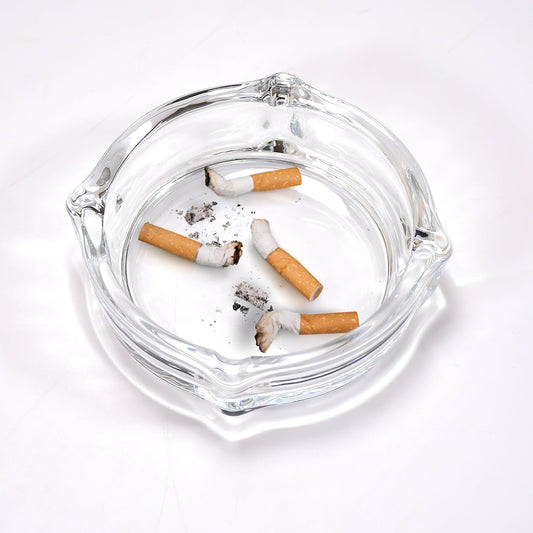 Crystal glass ashtray with a unique faceted design, ideal for cigars and cigarettes.