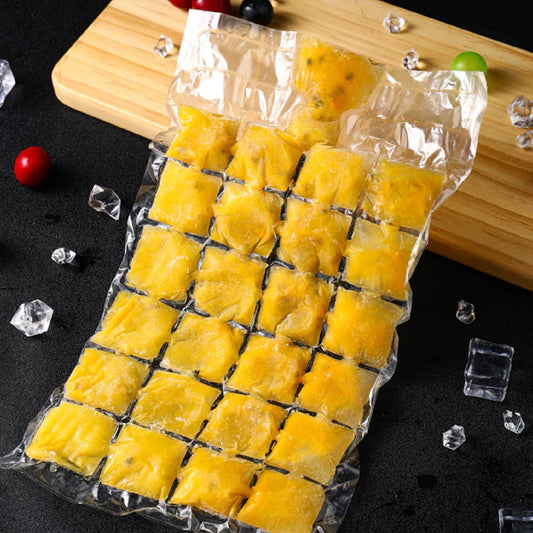 Multiple self-sealing disposable ice cube bags being filled with water for freezing.
