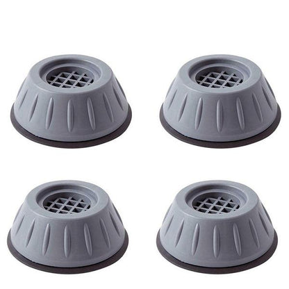 Four washer dryer vibration pads placed on floor surface