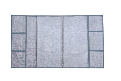 A Decorative Fridge Top Cover laid flat, highlighting its protective and aesthetic features.