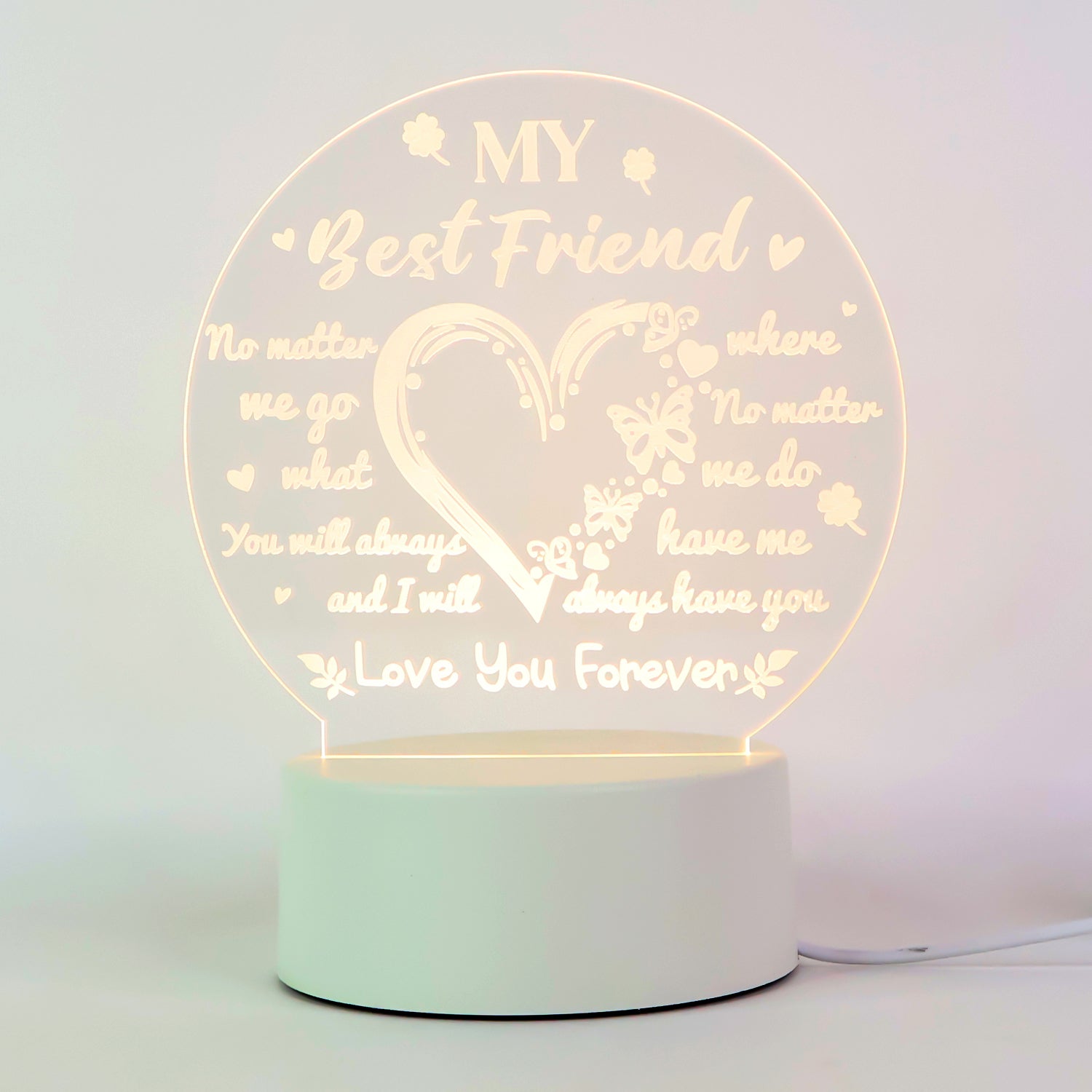 Close-up of acrylic acrylic plate with intricate friendship design in 3D LED lamp