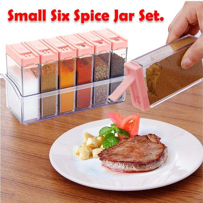 Complete set of six plastic spice jars in assorted vibrant colors.