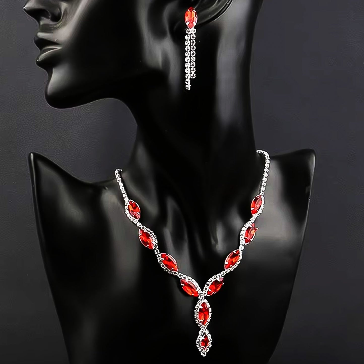 Stylishly arranged wedding jewelry set, highlighting intricate details and vibrant stones.