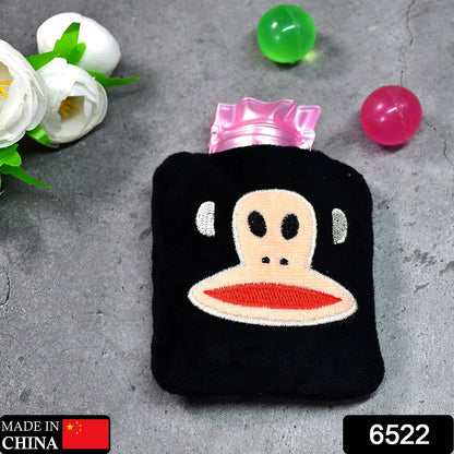 Close-up of the soft fabric emoji cover on the mini hot water bag.