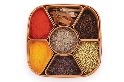 Masala Dabba filled with colorful Indian spices, ready for daily cooking.