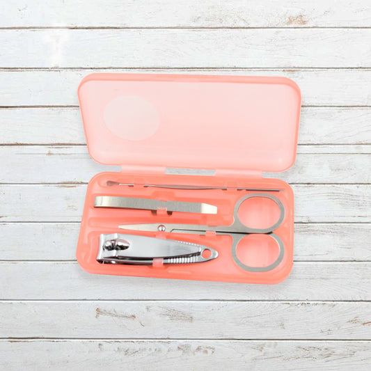 AuriGlam portable nail clipper set in its clear plastic travel case.