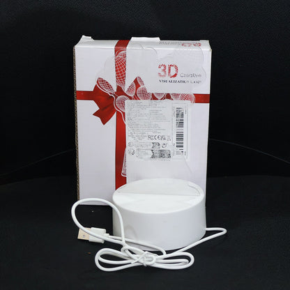 3D Illusion LED Night Lamp placed on shelf enhancing home décor ambiance