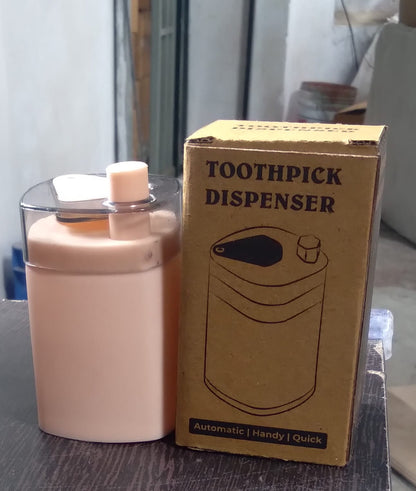 Automatic toothpick dispenser in a minimalist setting, ready for use.