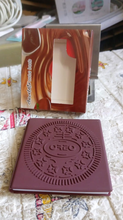 Packaging of the chocolate scented notebook, ideal for gifting.