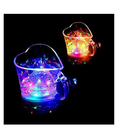 Side profile of the heart-shaped LED Glass Cup, ready for a drink.