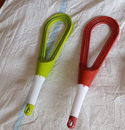 Close-up view of the durable plastic balloon whisk from Quickslice.