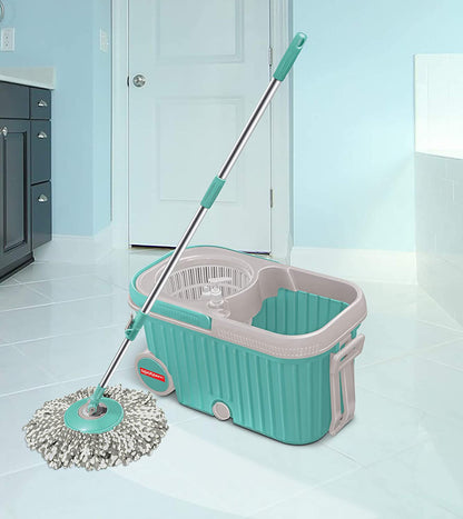 Ganesh 360 Spin Mop with Wheels, showcasing auto-fold handle and microfiber head.