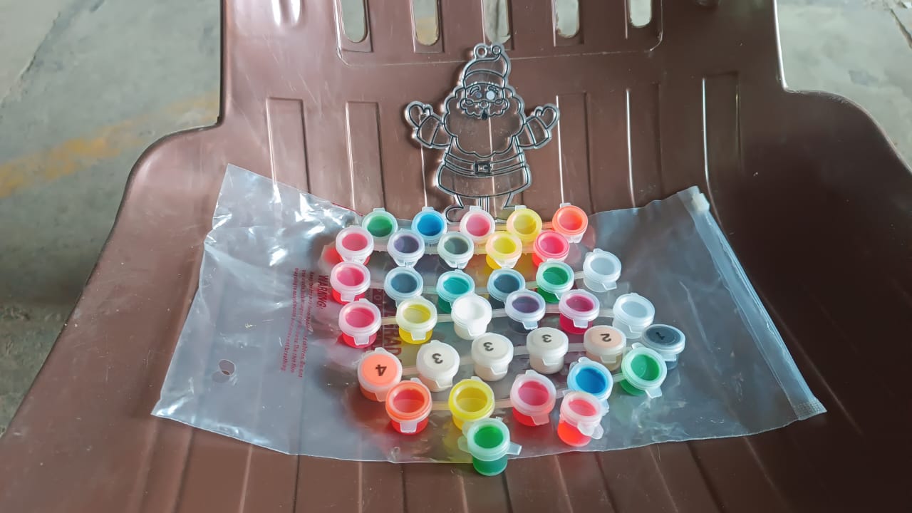 Packaging for the Paint by Numbers for Adults kit, highlighting its contents and brand.