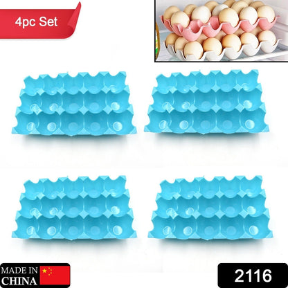 Stack of clear plastic egg trays, each holding 15 eggs, in a kitchen setting.
