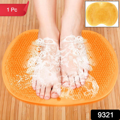 Yellow bath mat made of silicone with anti-slip suction cups fixed on bathroom floor