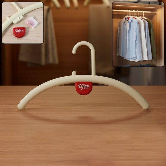 Anti-slip plastic clothes hanger with built-in fragrance holder for wardrobe organization