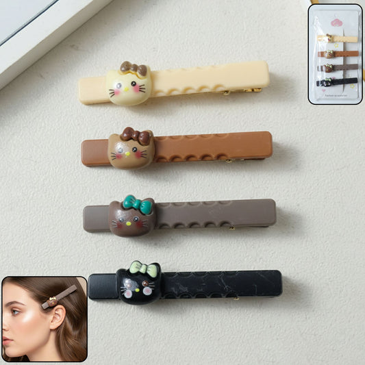 Set of cute cartoon cat hair clips with playful design