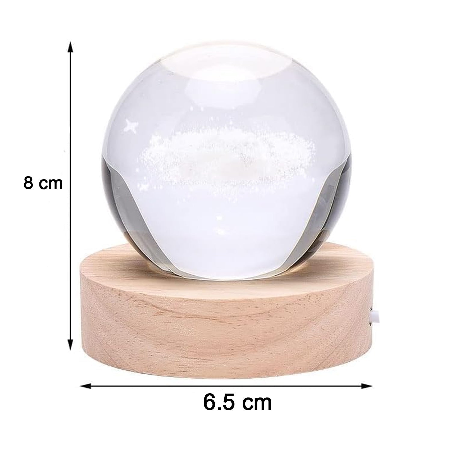 Hand holding the crystal ball lamp to show its compact size and portability.