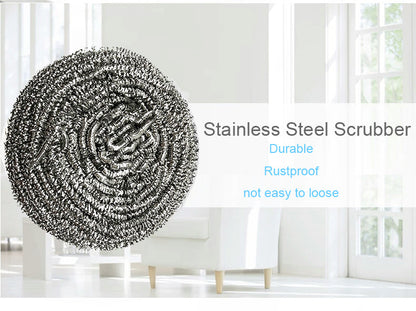 Round stainless steel scrubber shown in use, effortlessly removing tough stains from cookware.