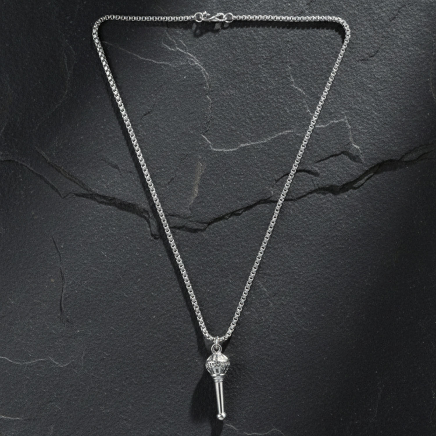 Another angle of the Hanuman Gada Pendant, emphasizing its symbolic design.