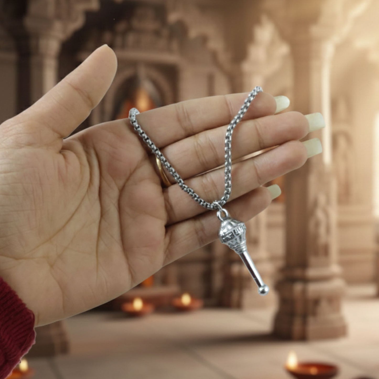 A person wearing the elegant Hanuman Gada Pendant, showcasing its daily wear appeal.